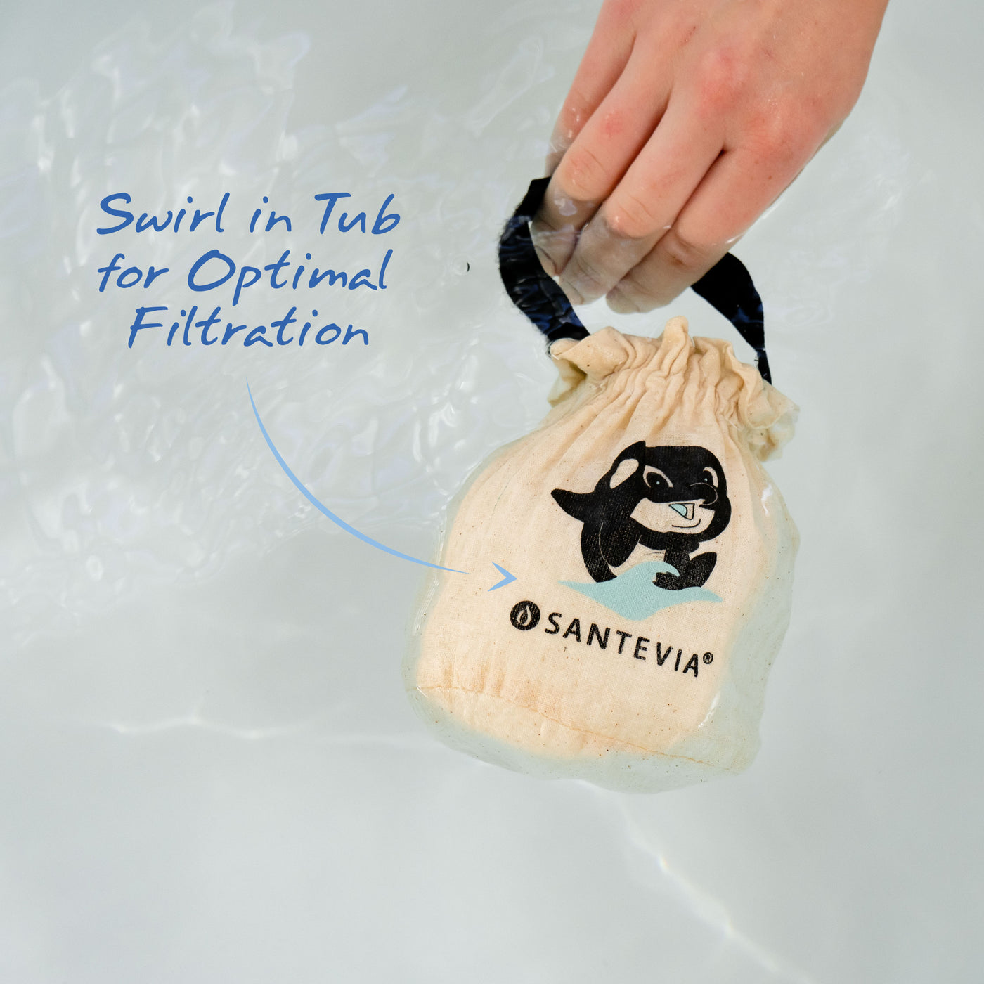 A Santevia Bath Filter being swirled in a bath tub. 